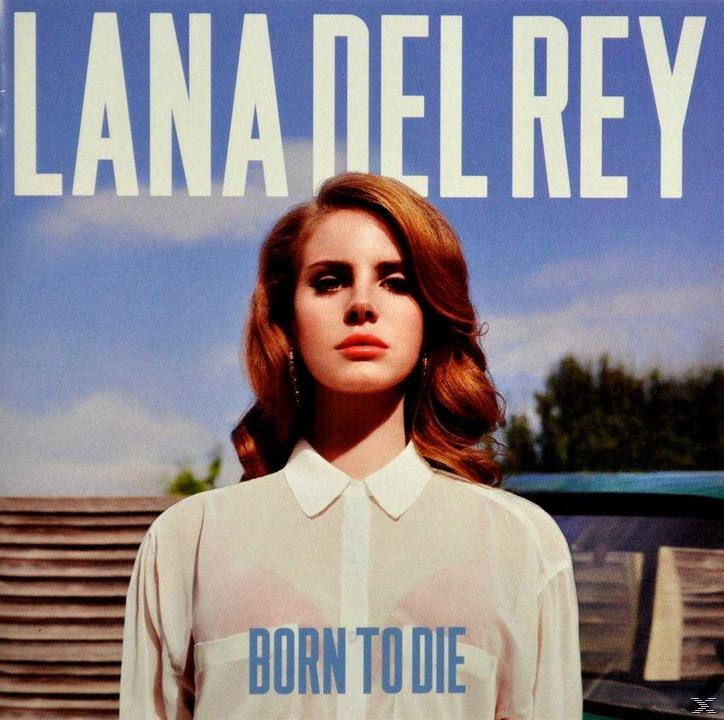 Pochette d'album de Lana Del Rey. Elle a les cheveux roux et porte une chemise blanche avec les mots Born To Die.