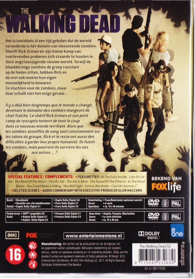 Couverture du DVD The Walking Dead avec un groupe de personnes et du texte en différentes langues.