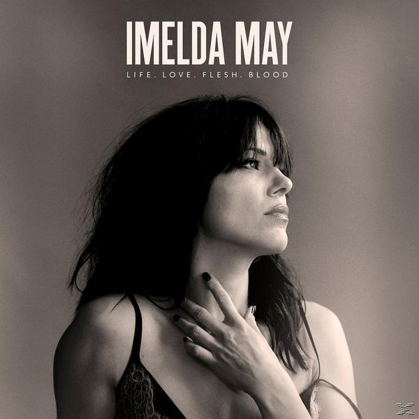 Albumcover mit einer Frau, die zur Seite blickt, mit den Worten 'Imelda May' und Albumtitel oben.