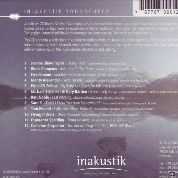 Rückseite einer CD-Hülle mit Text über Musiktitel. Titel und Namen sind aufgelistet.