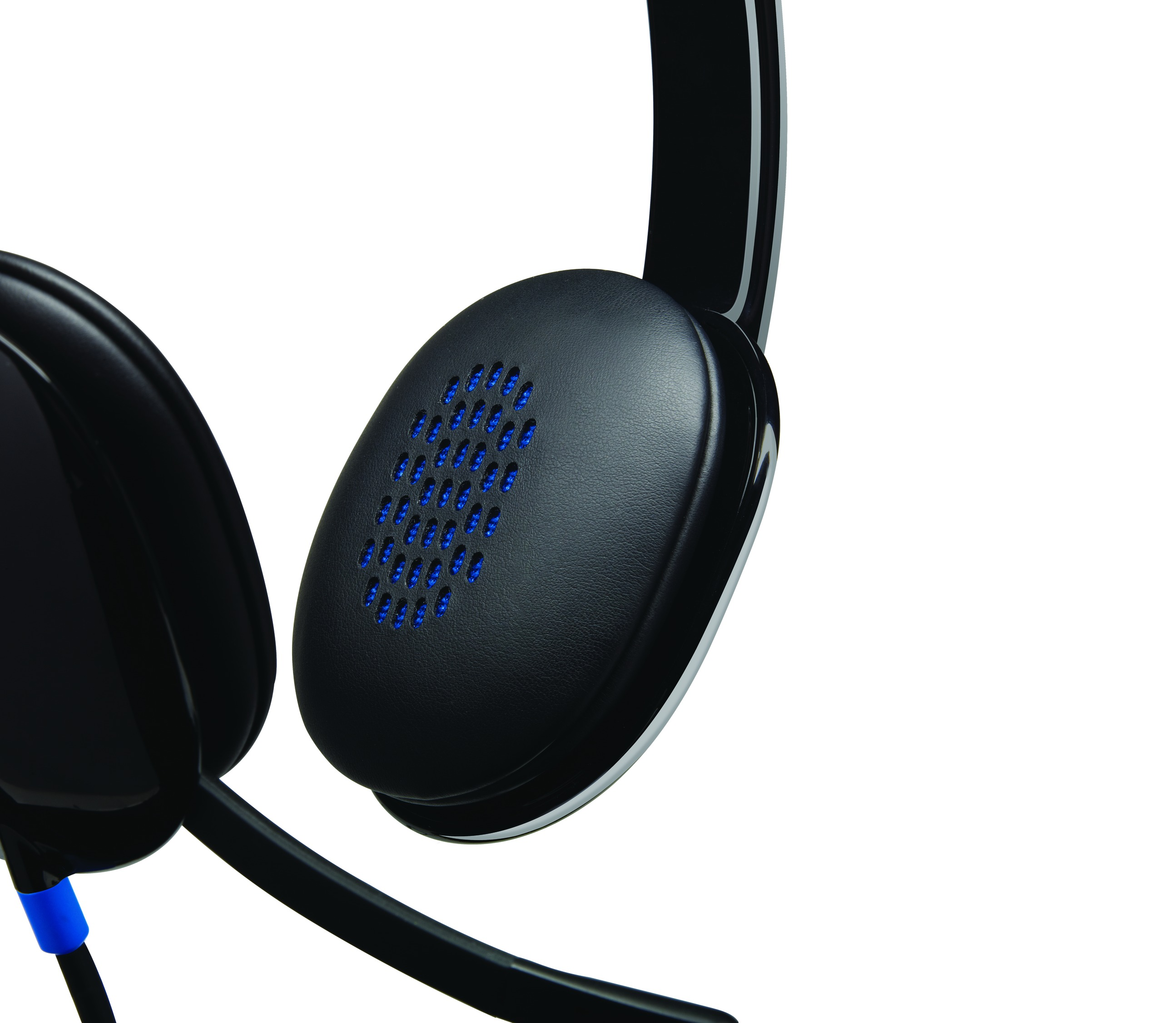 Close-up of black headphones with blue mesh details on the ear cup.
