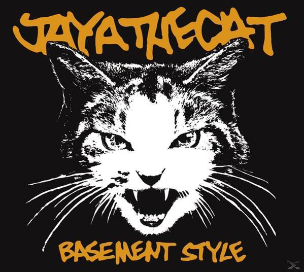 Schwarz-Weiß-Bild einer Katze mit dem Text 'Jaya the Cat' und 'Basement Style' in Orange.