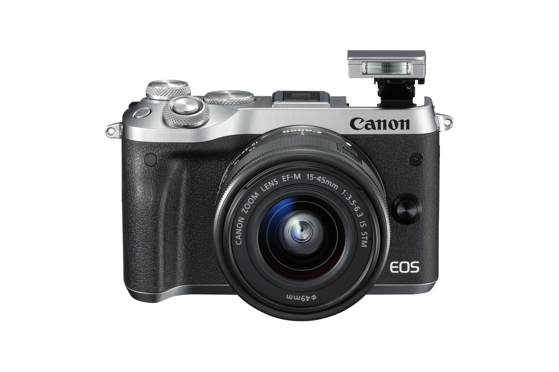 Een Canon-camera, zilver en zwart, met een lens en een flitser.