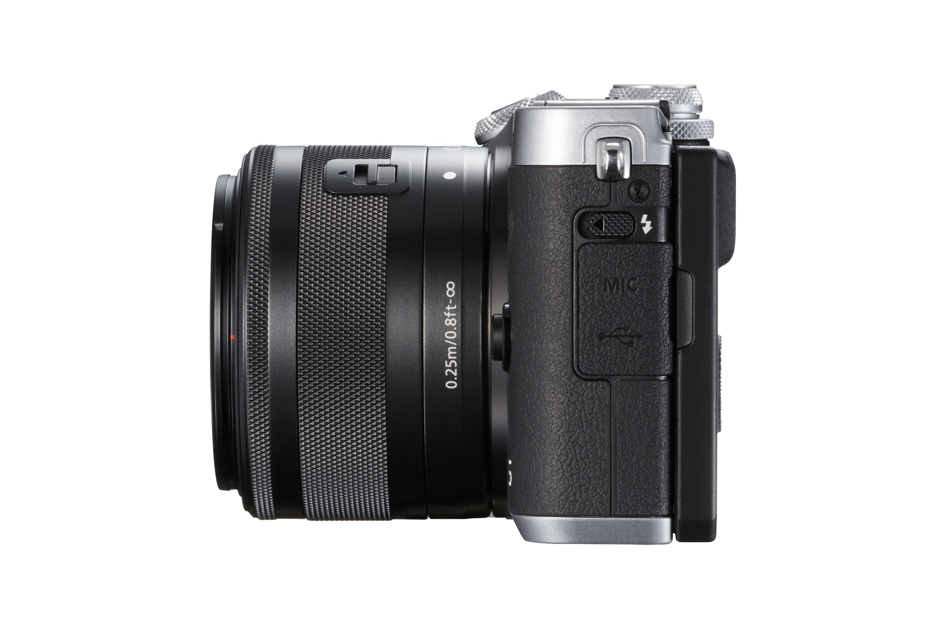 Een zwarte camera met een lens, geïsoleerd op een witte achtergrond, zijaanzicht.