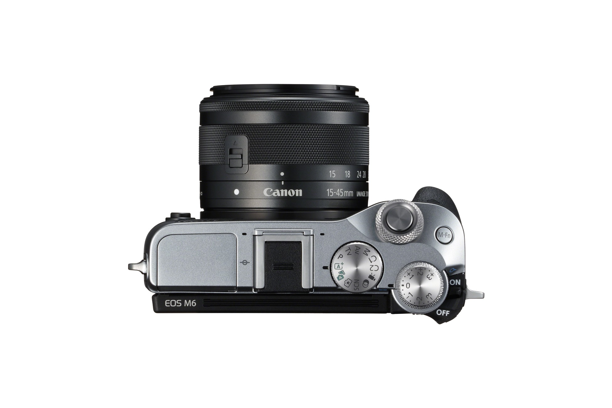 Bovenaanzicht van een zilveren Canon camera met een zwarte lens.