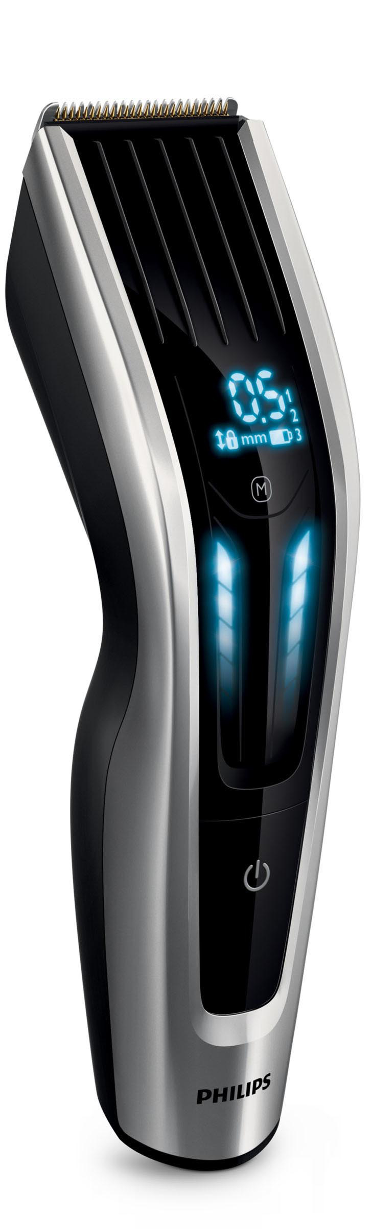 Schwarzer und silberner Philips Haarschneider mit digitaler Anzeige der Einstellungen.