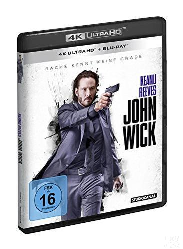 Filmcover von John Wick. Keanu Reeves hält eine Waffe, Text und Bewertung sind vorhanden.