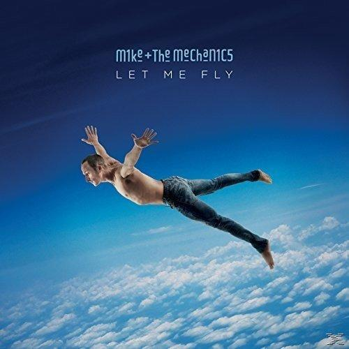 Albumcover eines Mannes, der am Himmel fliegt. Der Titel ist Let Me Fly von Mike + The Mechanics.