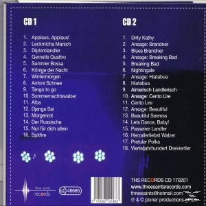 Die Rückseite einer CD mit Titellisten von zwei CDs. Die Hülle ist lila und weiß.