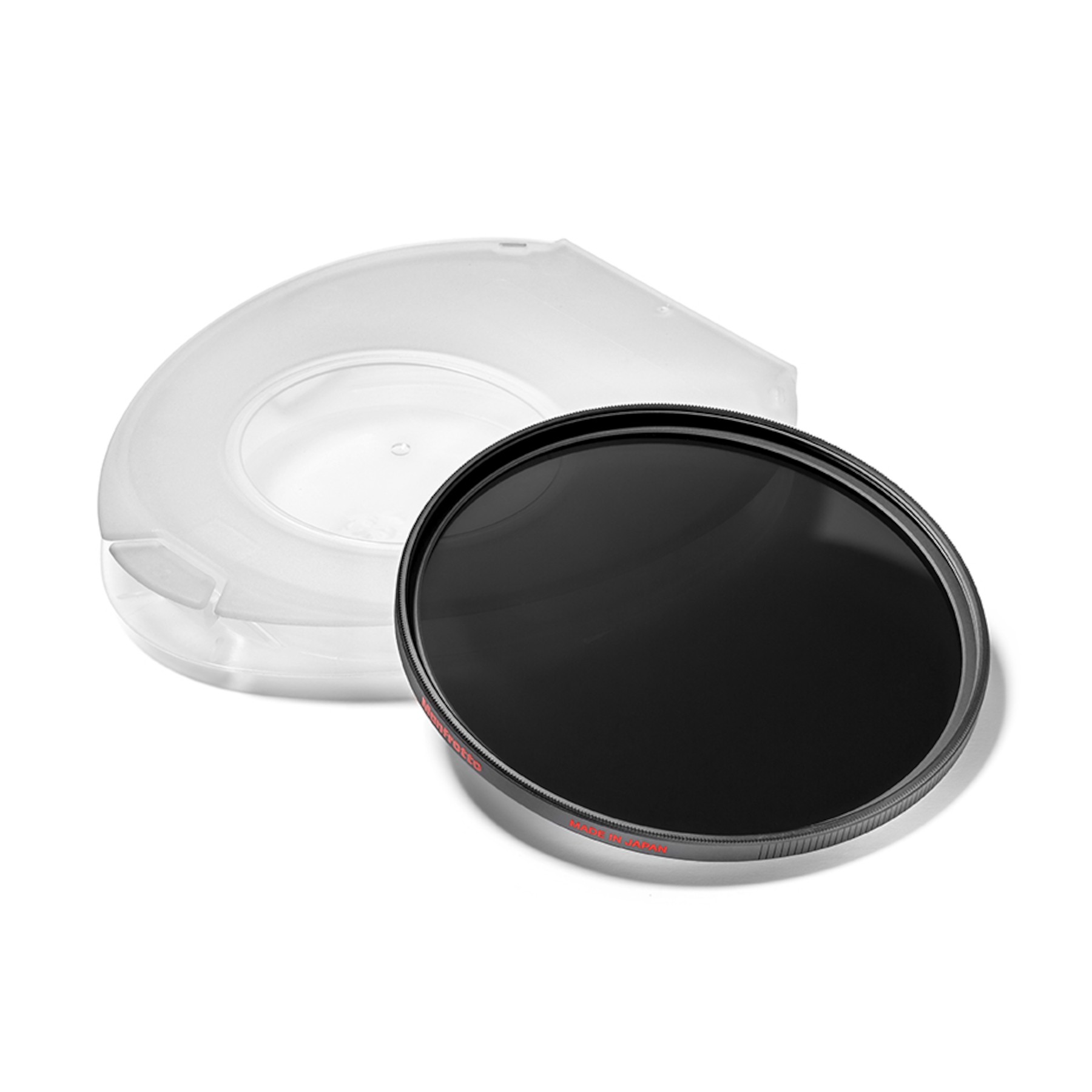 A black circular camera filter with a black rim and a transparent case on a white surface.
