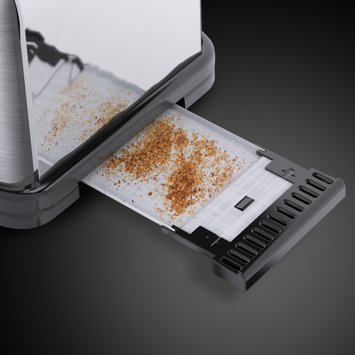 Toaster crumb tray, filled with crumbs, extracted from the toaster, on a gray background.