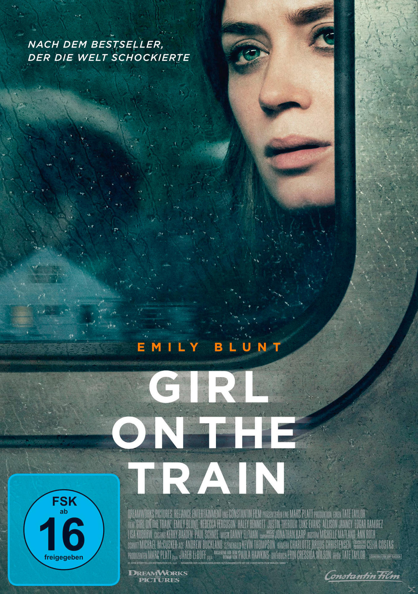 Filmposter. Frau schaut durch ein Fenster. Titel: 'GIRL ON THE TRAIN'.