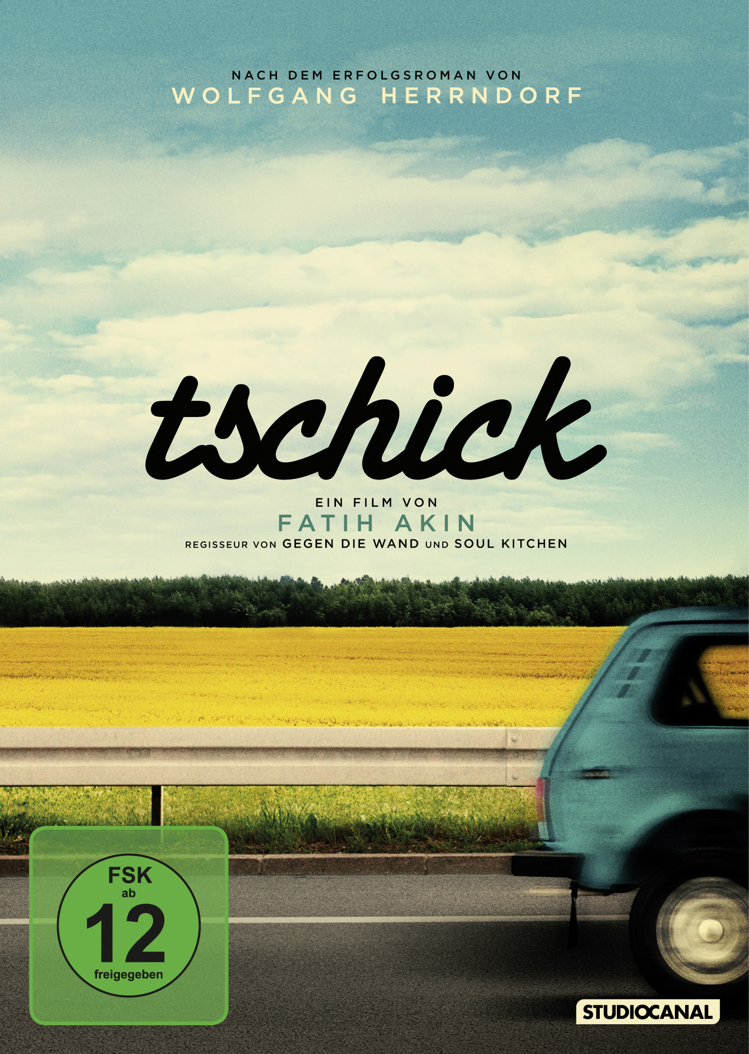 DVD-Cover. Ein Auto fährt auf einer Straße mit gelbem Feld und blauem Himmel im Hintergrund.