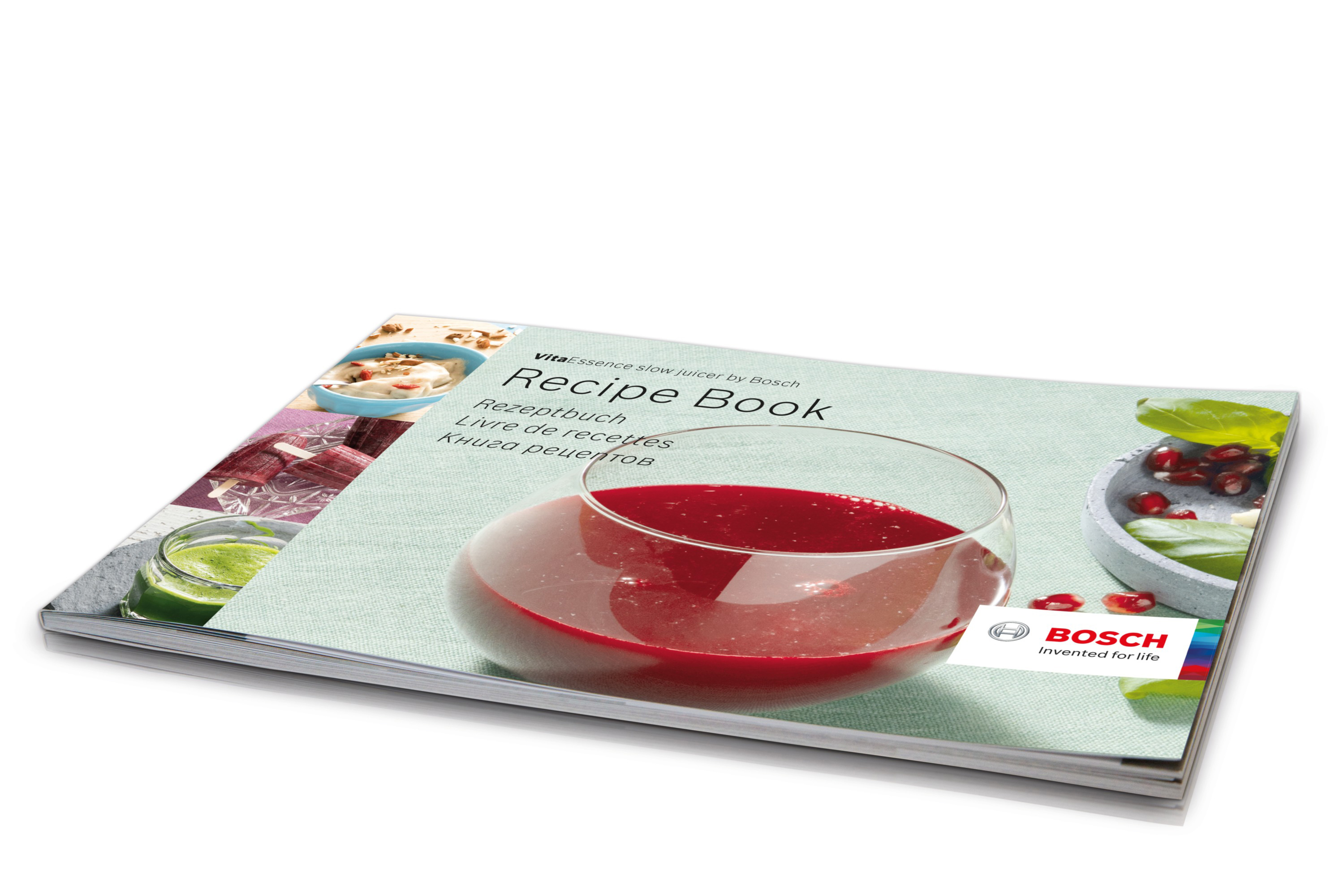 Livre de recettes avec verre de liquide rouge, logo Bosch. Fond blanc. Ingrédients visibles.