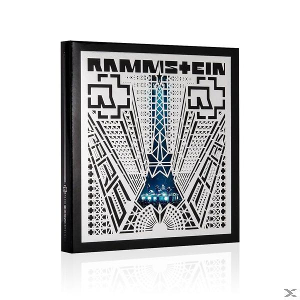 Couverture du livre : 'RAMMSTEIN' en blanc, avec graphisme de scène, couverture noire et reflet.