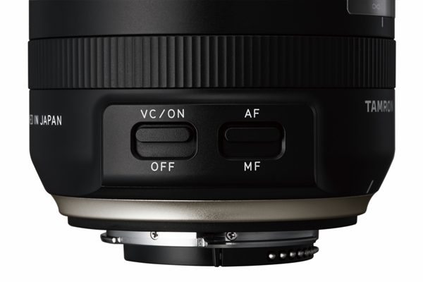 Tamron lens base with switches for VC/ON-OFF and AF-MF, black and gold colors.