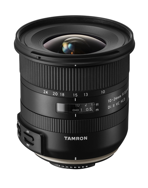 Black Tamron lens. It has several rings with numbers and text. The lens is on a white background.