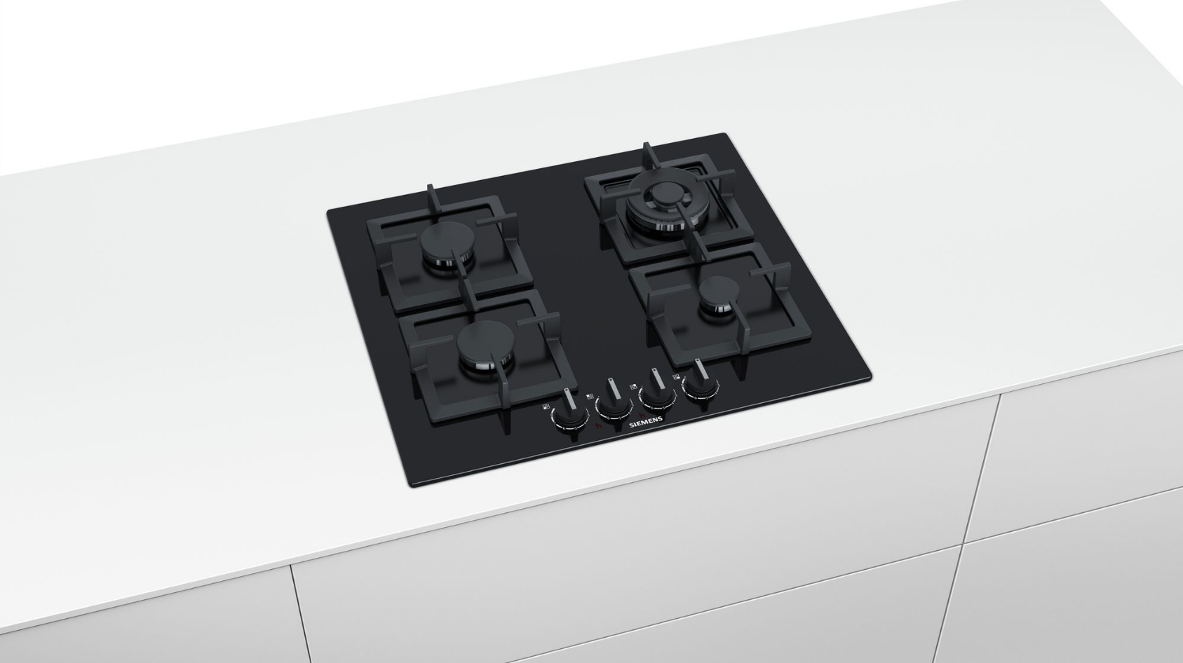 Black hob with four burners on a white surface. Three dials are visible.