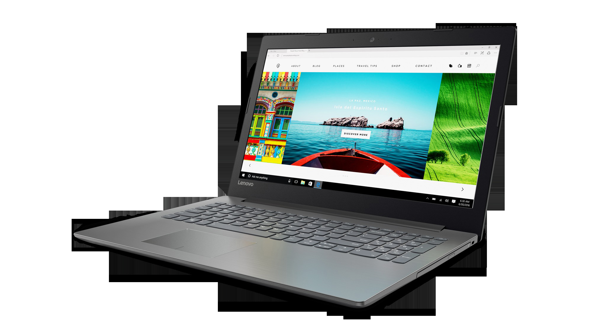 Silberner Lenovo-Laptop geöffnet, zeigt eine Reise-Website. Der Bildschirm zeigt farbenfrohe Bilder einer Küstenstadt.