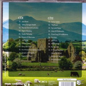 Albumcover, malerische Aussicht, grünes Feld, Berge im Hintergrund, Text.