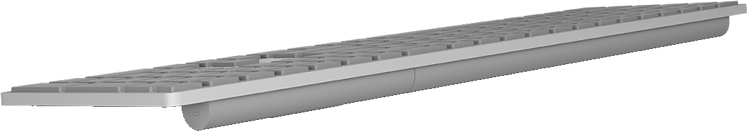 Een wit toetsenbord met een plat ontwerp, van opzij gezien.