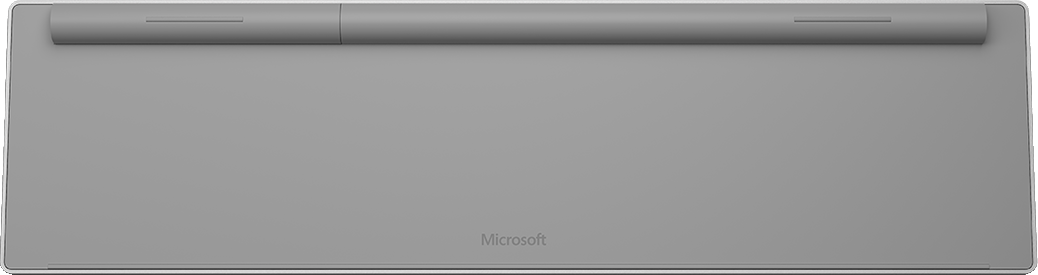 Een grijs rechthoekig toetsenbord. Het woord "Microsoft" staat onderaan.