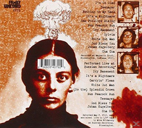 Albumcover mit Frauenporträt, Barcode und Titelliste. Über ihrem Kopf eine Atombombenwolke.
