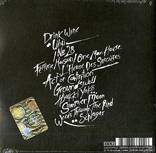 Album-Rückseite mit handgeschriebenen Songtiteln. Der Hintergrund ist schwarz mit weißer Schrift.