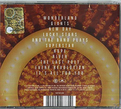 Dos du boîtier CD. Les titres de l'album sont listés avec un fond or et marron avec le nom et le logo du groupe.