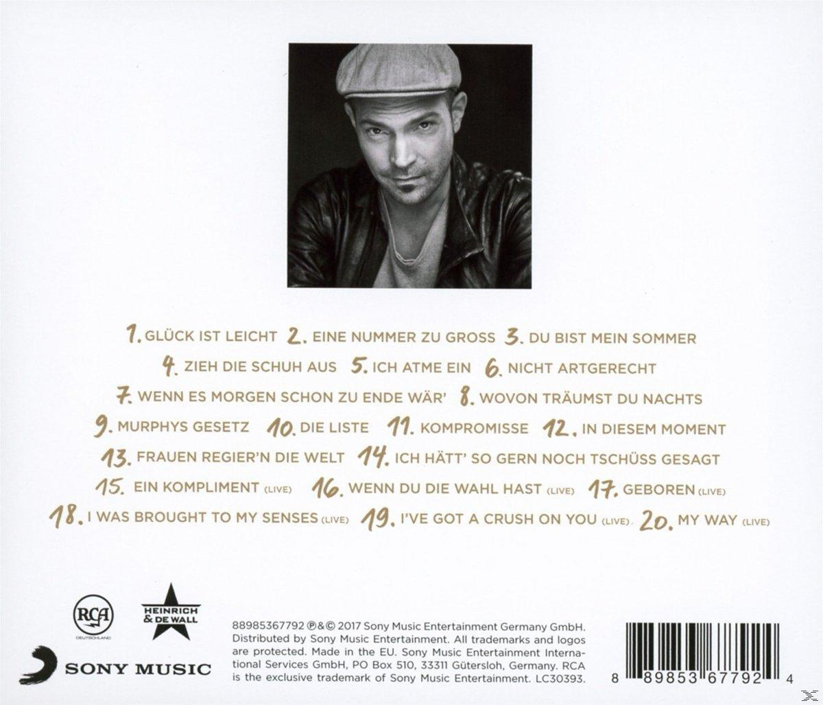 CD-Cover mit einem Mann, der eine Mütze trägt. Text enthält Titelliste und den Namen des Künstlers.