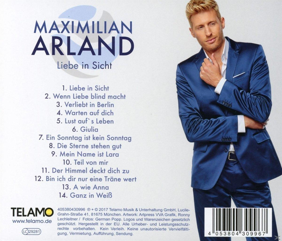 CD-Cover mit einem Mann in blauem Anzug und Titelliste.