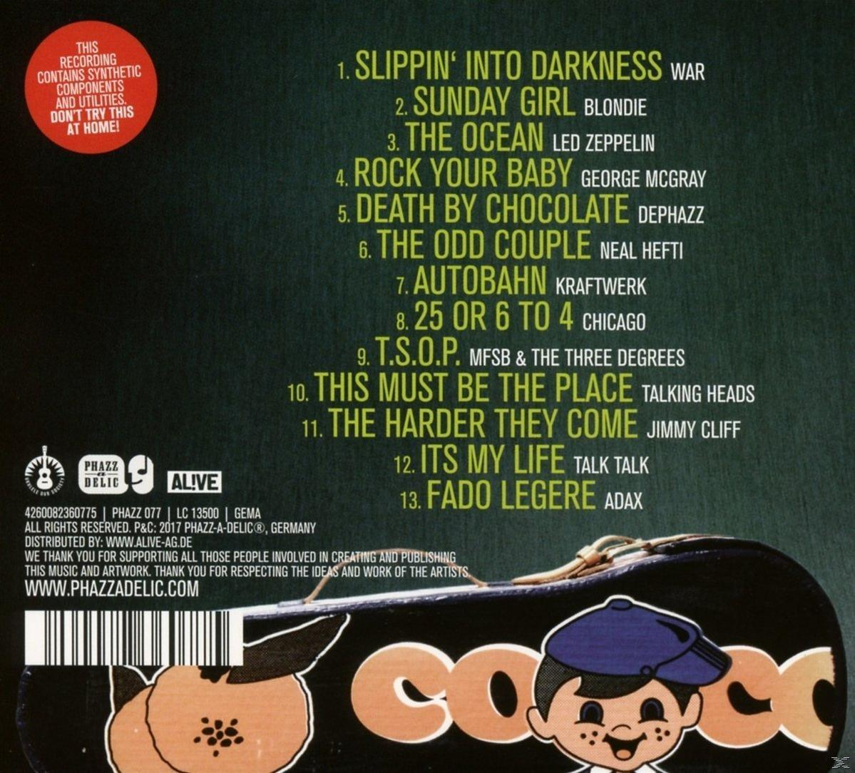 CD-Rückseite mit einer Liste von Songs und einer Comicfigur. Der Hintergrund ist schwarz.