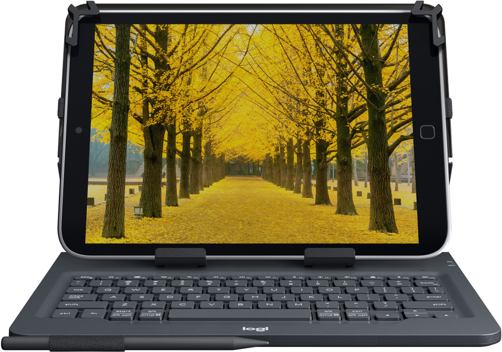 Une tablette fixée à un clavier. L'écran affiche un chemin bordé d'arbres aux feuilles jaunes.