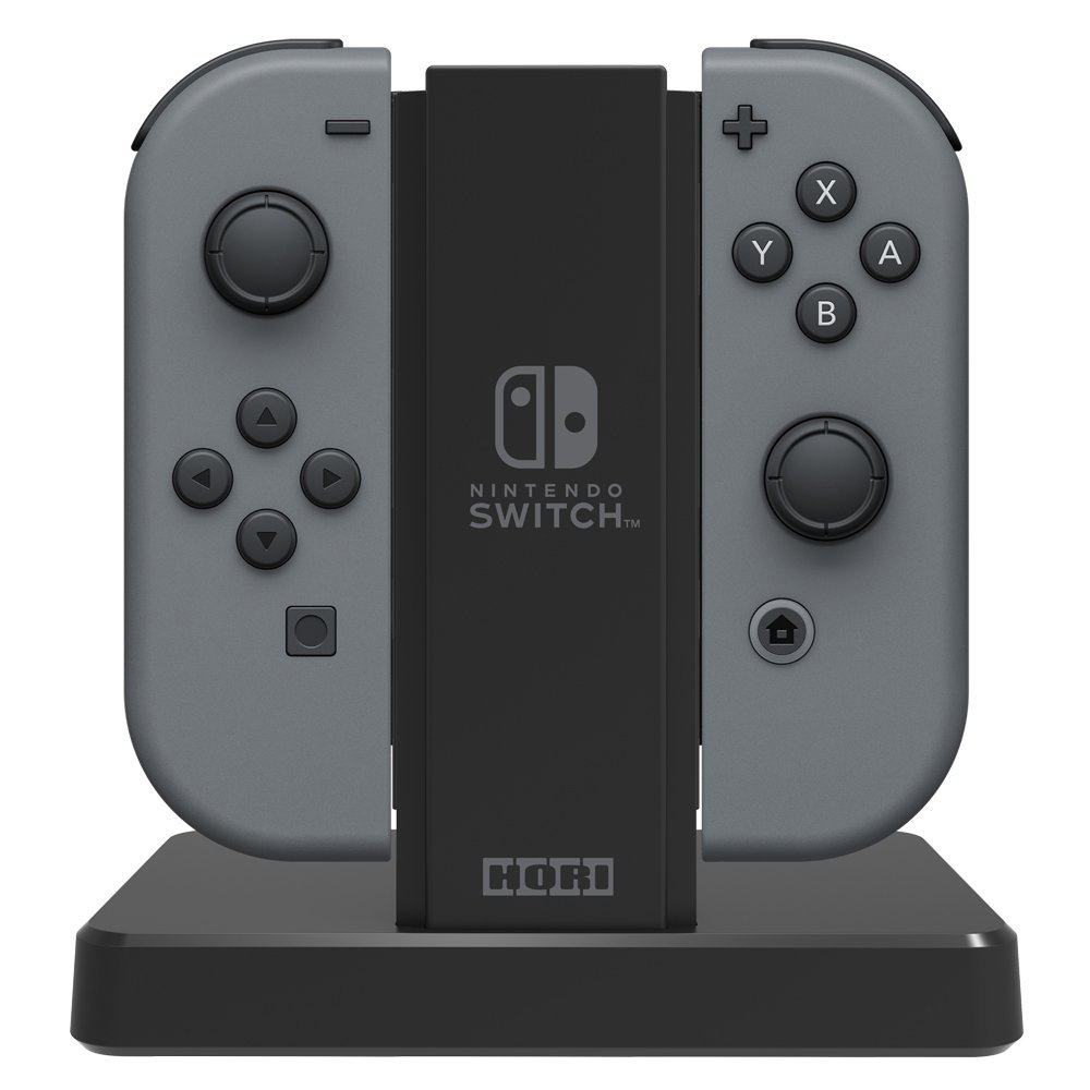 Base di ricarica per controller Nintendo Switch. Controller grigi, dock nero e base nera.
