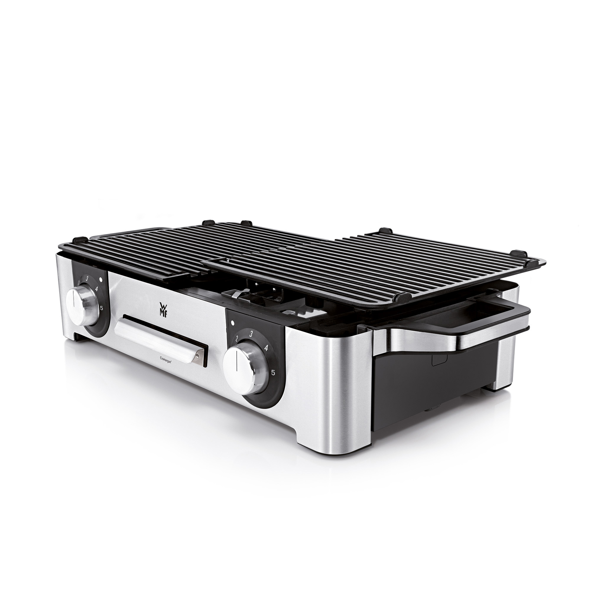 Silber-schwarzer Grill mit Drehknöpfen auf weißer Oberfläche.