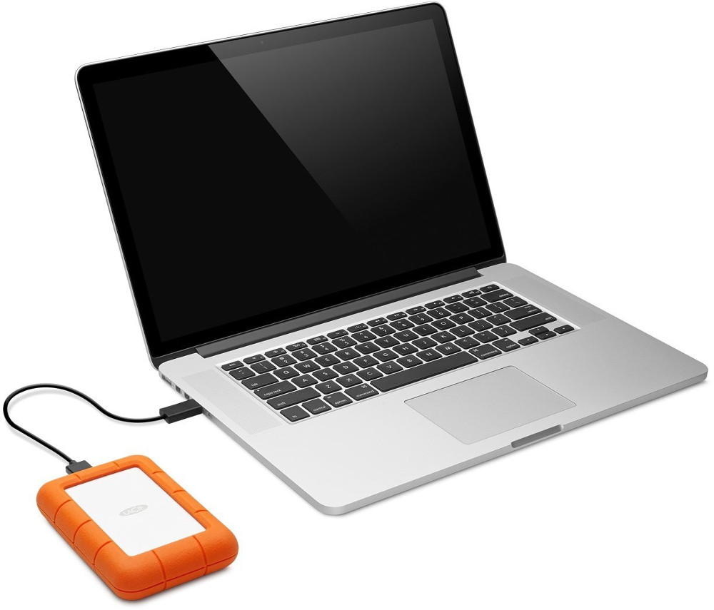 Laptop connected to an external orange hard drive.