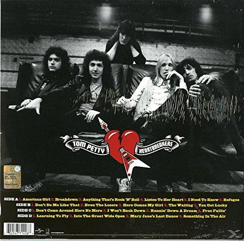 Tom Petty & The Heartbreakers Albumcover. Band sitzt auf Couch. Schwarz-Weiß.