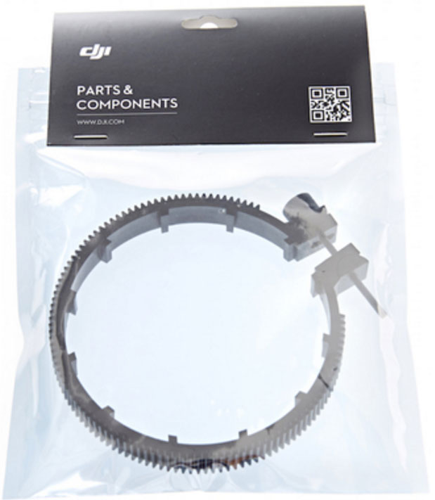 A plastic bag with a ring gear and a gear holder inside. DJI logo on top.