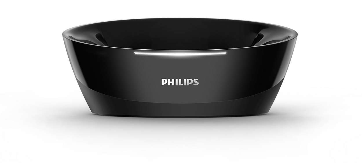 Eine glänzend schwarze Ladestation mit Philips-Logo und weißem Lichtstreifen, vor weißem Hintergrund.