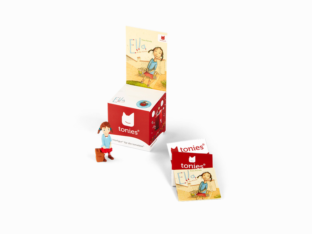 Ein Tonies-Box-Set mit einer Tonie-Figur und zwei Karten.