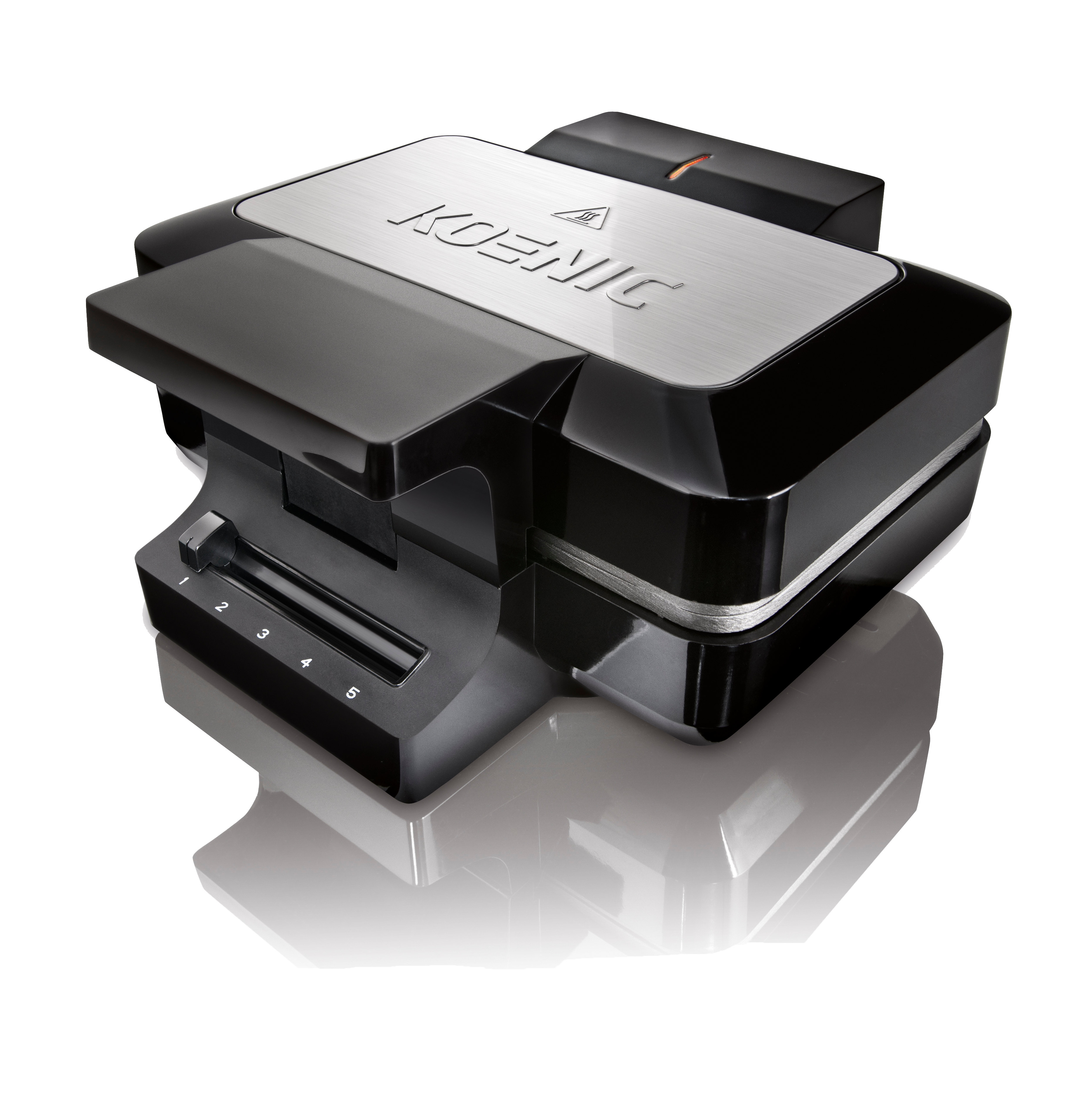 A black and silver waffle maker on a black surface. It has a Koenic logo on top and reflection below.