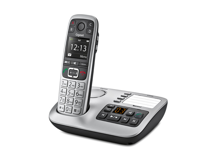 A silver Gigaset cordless phone on a silver base, the screen displays the time. The handset is upright.