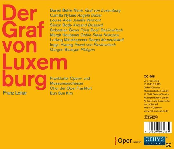 Buchcover, orange mit weißem und rotem Text. Listet Namen auf. Text: Der Graf von Luxemburg.
