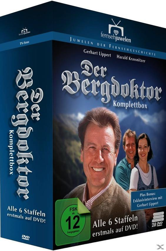 DVD-Box-Set von 'Der Bergdoktor'. Zeigt drei Personen mit Bergkulisse.