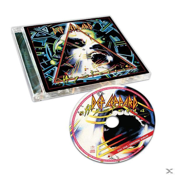 Def Leppard Hysteria CD-Hülle und -Disc. Das Cover zeigt ein Gesicht mit einem Dreieck darum.
