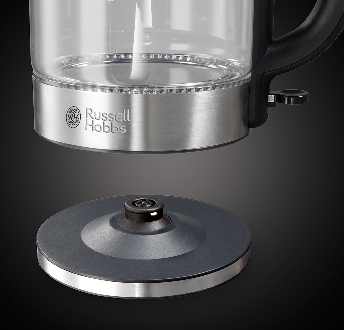 Glaskessel mit Edelstahlbasis, schwarzem Griff und Sockel. Russell Hobbs Logo.