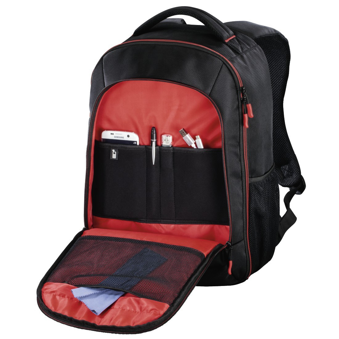 Zaino nero con dettagli rossi. L'interno aperto rivela tasche e contenuto.