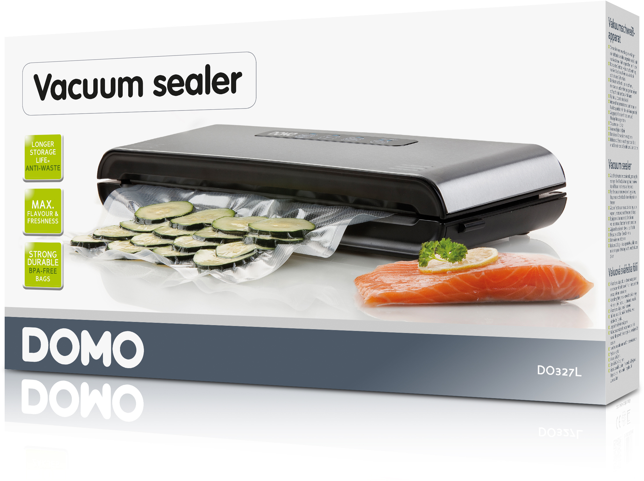 Une boîte de scelleuse sous vide avec la scelleuse et de la nourriture à l'intérieur du sac. Courgettes tranchées et saumon.