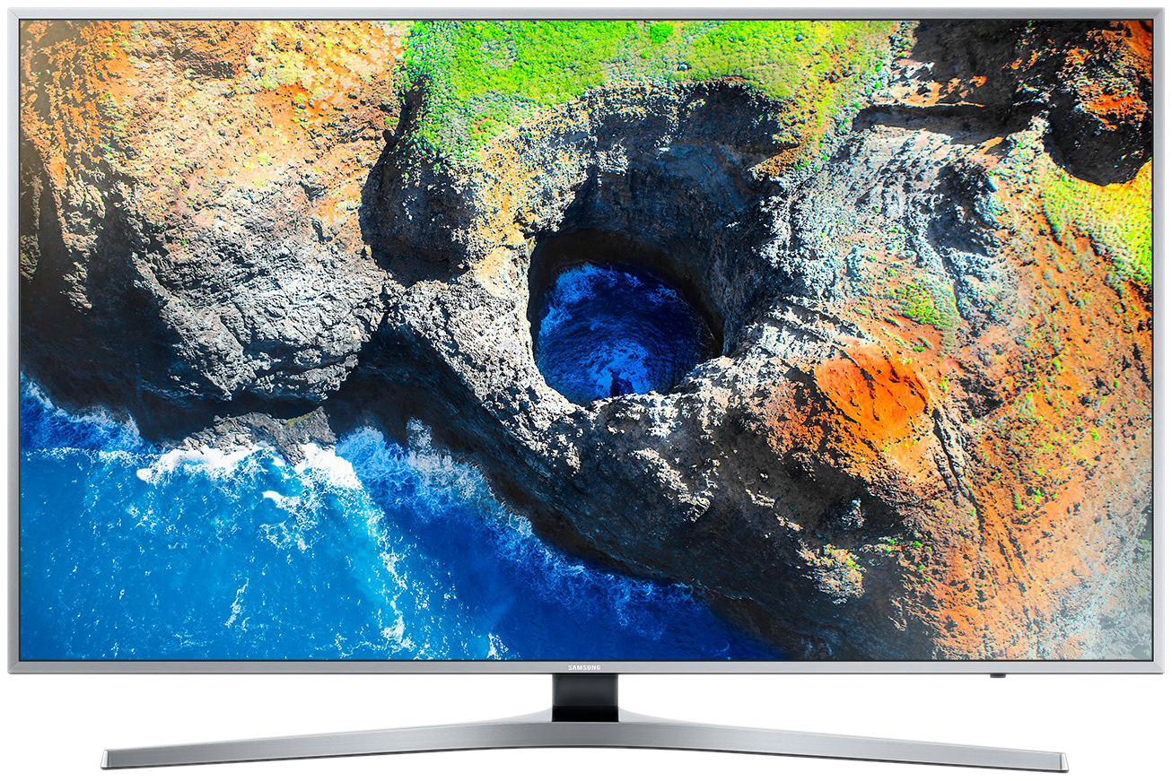 TV-Bildschirm mit Landschaft mit Ozean, Felsen und Loch. Der Fernseher hat einen silbernen Rahmen.
