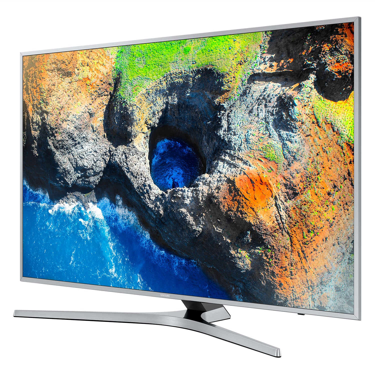 Ein Breitbild-TV, das eine lebendige Landschaft mit Meer, Klippen und einer Höhle zeigt.